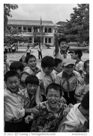 Schoolchildren during recess. Vietnam (black and white)