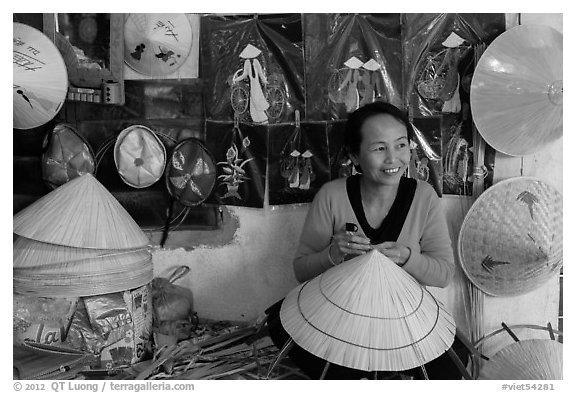 Woman in hat-making workshop. Hue, Vietnam