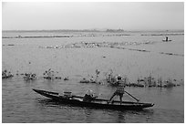 Villagers on flooded fields. Hue, Vietnam (black and white)