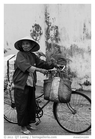 Elderly woman with bicycle, Thanh Toan. Hue, Vietnam