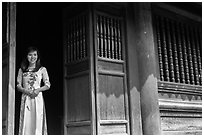 Woman in doorway, Temple of the Litterature. Hanoi, Vietnam ( black and white)