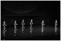 Water puppets (6 characters with lotus), Thang Long Theatre. Hanoi, Vietnam ( black and white)