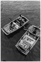 Vendors on boats seen from above. Halong Bay, Vietnam ( black and white)