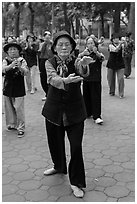 Elderly women practising Tai Chi. Hanoi, Vietnam ( black and white)