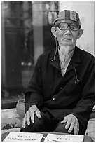 Elderly fortune teller, Trang An. Vietnam (black and white)