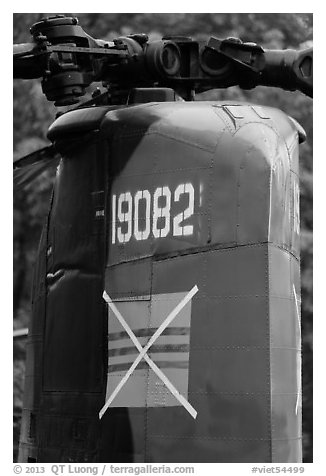 Helicopter tail with crossed-out flag of South Vietnam, Hanoi Citadel. Hanoi, Vietnam (black and white)