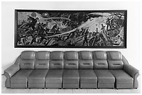 Propaganda painting and couch, military museum. Hanoi, Vietnam ( black and white)