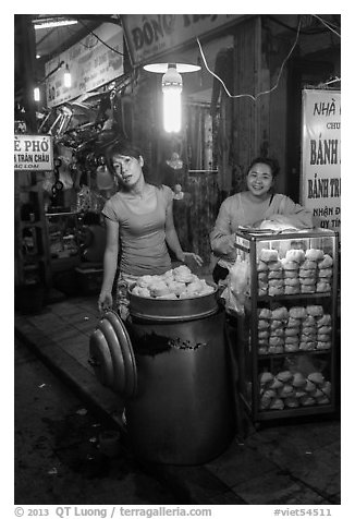 Dumpling vendors at night, old quarter. Hanoi, Vietnam (black and white)