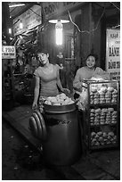 Dumpling vendors at night, old quarter. Hanoi, Vietnam (black and white)