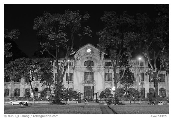 Colonial-area buildings bordering Ba Dinh Square at night. Hanoi, Vietnam (black and white)
