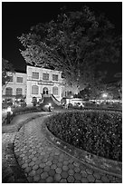 Public garden and library building at night. Hanoi, Vietnam ( black and white)