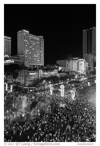 Packed Nguyen Hue boulevard on Christmas eve from above. Ho Chi Minh City, Vietnam (black and white)