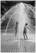 Children in fountain, Dam Sen Water Park, district 11. Ho Chi Minh City, Vietnam ( black and white)