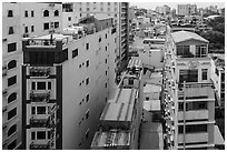 Rooftop view of skinny hotel buildings. Ho Chi Minh City, Vietnam ( black and white)