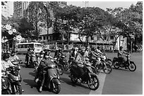 Motorbike riders waiting at intersection. Ho Chi Minh City, Vietnam ( black and white)