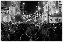 Packed street at night, New Year eve. Ho Chi Minh City, Vietnam (black and white)