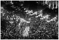 Le Loi boulevard with decorations and crowds from above. Ho Chi Minh City, Vietnam (black and white)