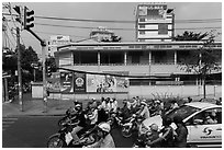 Traffic waiting at intersection. Ho Chi Minh City, Vietnam (black and white)