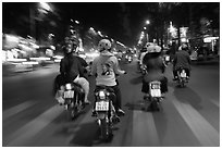 Motorbike riders at night from riders perspective. Ho Chi Minh City, Vietnam ( black and white)