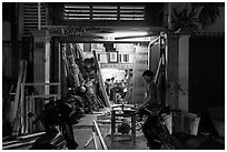 Frame shop at night. Ho Chi Minh City, Vietnam ( black and white)