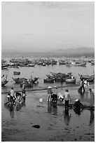 Miror-like beach and fishing boats, early morning. Mui Ne, Vietnam ( black and white)