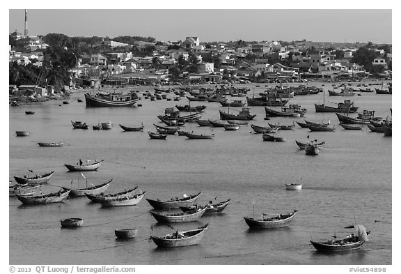 Fishing boats and village. Mui Ne, Vietnam (black and white)
