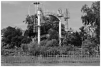 Coconut monk temple seen from water, Phoenix Island. My Tho, Vietnam ( black and white)