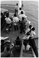 People on ferry seen from above. Mekong Delta, Vietnam (black and white)