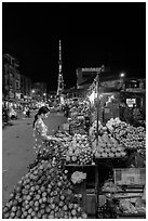 Fruit vendor on main street at night. Tra Vinh, Vietnam ( black and white)