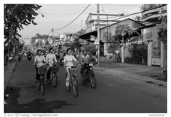 Schoolgirls on bicycles. Tra Vinh, Vietnam