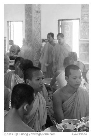 Theravada monks in dining room, Hang Pagoda. Tra Vinh, Vietnam (black and white)