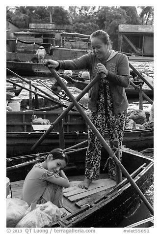 Woman and girl, Phung Diem floating market. Can Tho, Vietnam (black and white)