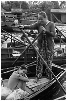 Woman and girl, Phung Diem floating market. Can Tho, Vietnam ( black and white)