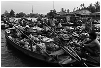 Boats closely decked together, Phung Diem floating market. Can Tho, Vietnam ( black and white)