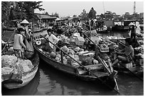 Produce transaction on Phung Diem floating market. Can Tho, Vietnam (black and white)
