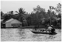 Schoolchildren on boat commute. Can Tho, Vietnam ( black and white)