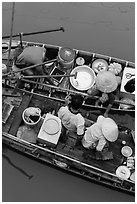 Couples on two side-by-side boats seen from above. Can Tho, Vietnam ( black and white)