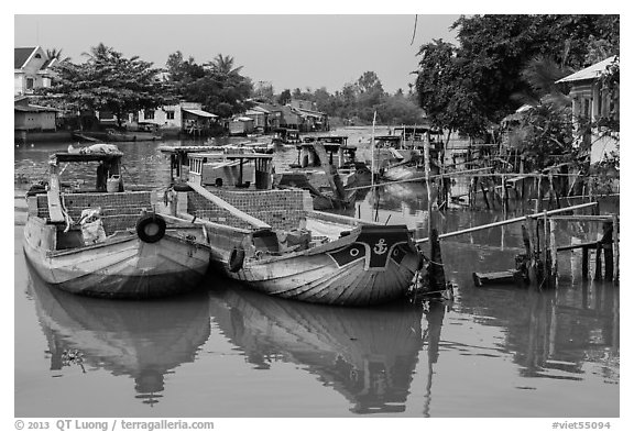 Boats loaded with bricks. Can Tho, Vietnam (black and white)