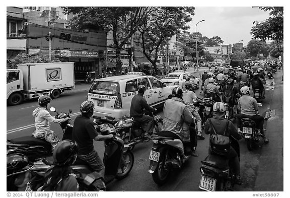 Dense motorcycle traffic. Ho Chi Minh City, Vietnam (black and white)