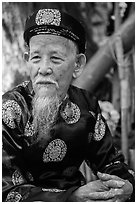 Elder in traditional costume. Ho Chi Minh City, Vietnam ( black and white)