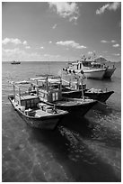 Fishing boats floating on clear water, Con Son. Con Dao Islands, Vietnam ( black and white)