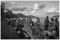 Food vendors on seafront promenade, Con Son. Con Dao Islands, Vietnam ( black and white)