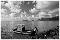 Fisherman climbing on boat, Con Son. Con Dao Islands, Vietnam ( black and white)