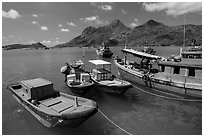 Fishing boats and Ba Island, Ben Dam. Con Dao Islands, Vietnam ( black and white)
