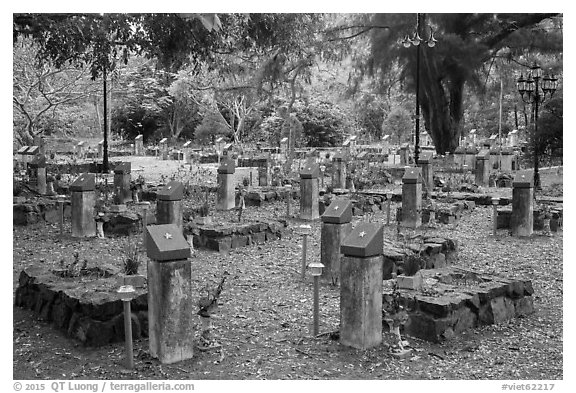 Graves memorializing independence fighters who died in jail. Con Dao Islands, Vietnam (black and white)