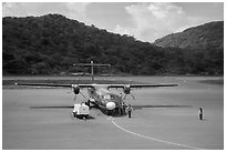 Turboprop plane and airport. Con Dao Islands, Vietnam ( black and white)