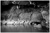 Tour boat getting out of a tunnel, Phong Nha Cave. Vietnam (black and white)