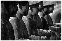 Row of statues in Khai Dinh Mausoleum. Hue, Vietnam ( black and white)