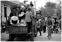 Riding in the back of an overloaded truck. Northest Vietnam ( black and white)
