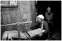 Elderly woman weaving in her home. Northeast Vietnam ( black and white)